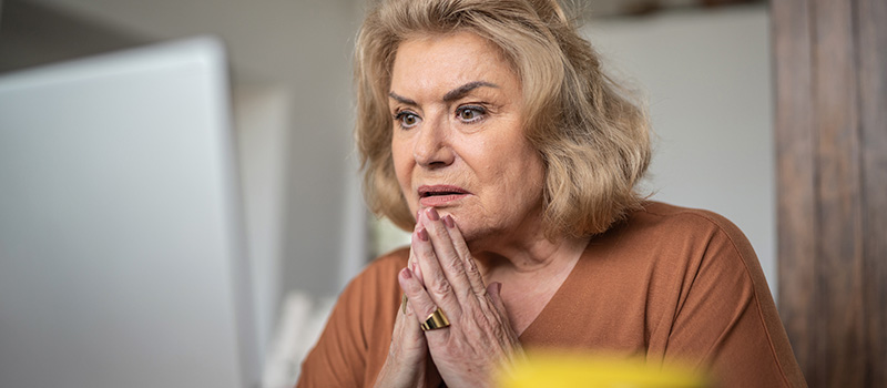 Woman looking at a computer screen